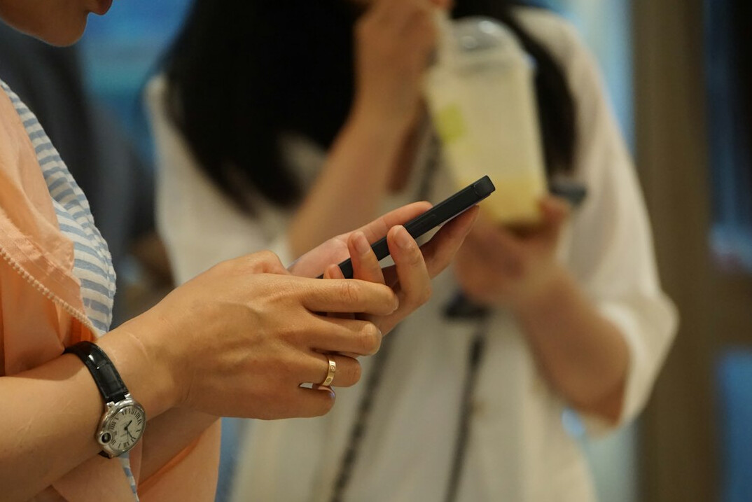 people using smartphones