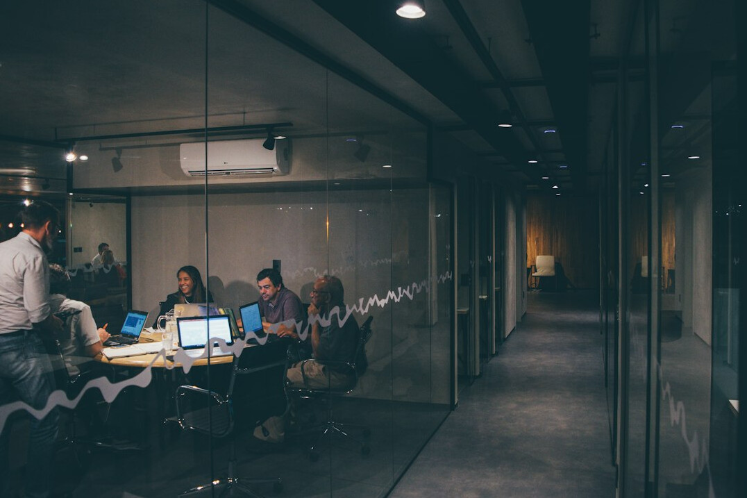 people collaborating in office