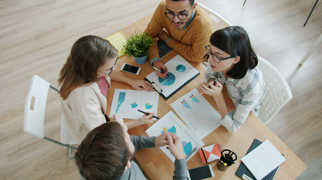 people discussing in group