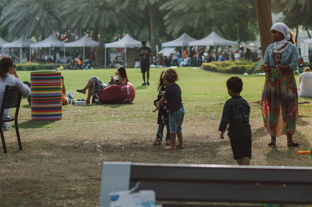 diverse people in city park